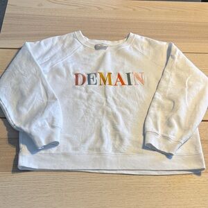 Sezane White Sweater with Multicolor 'DEMAIN' Embroidery fits more like a Médium